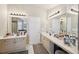 Spacious bathroom with double vanities, great lighting, and vanity area for added convenience at 852 Van Briggle Path, Sugar Hill, GA 30518