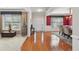 The foyer has hardwood floors and elegant decor and leads into the dining room at 852 Van Briggle Path, Sugar Hill, GA 30518