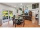 Spacious kitchen with hardwood floors that opens to the living room and patio, great for entertaining at 852 Van Briggle Path, Sugar Hill, GA 30518