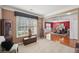 Cozy living room area leading to dining room with elegant decor and natural light at 852 Van Briggle Path, Sugar Hill, GA 30518
