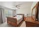 Main bedroom with carpet, ceiling fan and natural light at 852 Van Briggle Path, Sugar Hill, GA 30518