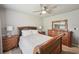 Main bedroom with carpet, ceiling fan and natural light at 852 Van Briggle Path, Sugar Hill, GA 30518