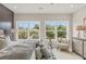 Comfortable primary bedroom with lots of natural light and neutral colors at 925 Willingham Dr # 13, Hapeville, GA 30354