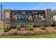 A welcoming community sign with floral design and the word Serenity at 925 Willingham Dr # 13, Hapeville, GA 30354