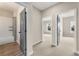 Hallway provides entry to tiled bathroom and bedroom with lots of light at 925 Willingham Dr # 13, Hapeville, GA 30354