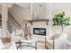 Inviting living room with fireplace and ample natural light at 925 Willingham Dr # 13, Hapeville, GA 30354
