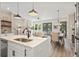 Bright living space boasts an open floor plan with modern finishes and hardwood floors at 925 Willingham Dr # 13, Hapeville, GA 30354