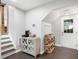 Entryway with white walls, dark wood floors, hooks, shelves, and a coffee bar at 2377 Emory Ln, Marietta, GA 30068