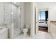 Bright bathroom featuring a glass shower, soaking tub, and elegant finishes with bedroom access at 2828 Peachtree Nw Rd # 1502, Atlanta, GA 30305