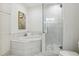 Luxurious bathroom showcasing a soaking tub, glass-enclosed shower, and stylish finishes at 2828 Peachtree Nw Rd # 1502, Atlanta, GA 30305