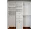 Well-designed closet featuring custom shelving, drawers, and ample storage space for organization at 2828 Peachtree Nw Rd # 1502, Atlanta, GA 30305