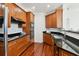 A kitchen area offering granite countertops, cabinetry and stainless steel appliances at 2828 Peachtree Nw Rd # 1502, Atlanta, GA 30305