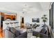 Open living room with bar seating and city views from large windows at 2828 Peachtree Nw Rd # 1502, Atlanta, GA 30305