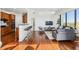 Spacious living room with a kitchen bar and bright natural lighting at 2828 Peachtree Nw Rd # 1502, Atlanta, GA 30305