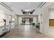 Bright lobby with stylish light fixture, wood floors, and modern decor creates an inviting entrance at 2828 Peachtree Nw Rd # 1502, Atlanta, GA 30305