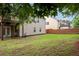 Enjoy the outdoors in this expansive backyard with a patio, deck, and plenty of green space at 4040 Brightmore Dr, Austell, GA 30106