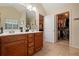 Bathroom with double vanity and walk-in closet at 4040 Brightmore Dr, Austell, GA 30106