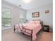 Bedroom with natural light from the two windows at 4040 Brightmore Dr, Austell, GA 30106