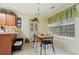 Bright breakfast nook featuring a modern table set near a large window, filled with natural light at 4040 Brightmore Dr, Austell, GA 30106