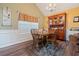 Inviting dining room featuring a wooden table and chairs, complemented by a decorative hutch at 4040 Brightmore Dr, Austell, GA 30106