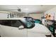 Spacious garage featuring parking for two cars with storage shelving and an automatic door at 4040 Brightmore Dr, Austell, GA 30106