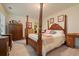 Main bedroom featuring a four-poster bed and spacious layout at 4040 Brightmore Dr, Austell, GA 30106