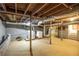 Unfinished basement with laundry hookups and exposed ductwork awaiting your creative vision at 1558 Boulderwoods Se Dr, Atlanta, GA 30316
