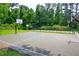 Community basketball court surrounded by green space at 1558 Boulderwoods Se Dr, Atlanta, GA 30316