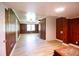 Inviting living room featuring beautiful wood paneling, light floors, and a bright, airy atmosphere at 1558 Boulderwoods Se Dr, Atlanta, GA 30316