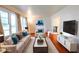 Bright living room with hardwood floors and modern furniture at 1558 Boulderwoods Se Dr, Atlanta, GA 30316