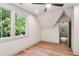 A bonus bedroom with hardwood floors, and natural light; entryway into another room at 298 Saint Marys Nw Ln, Marietta, GA 30064
