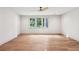 Bonus room features hardwood floors, natural light and white walls at 298 Saint Marys Nw Ln, Marietta, GA 30064