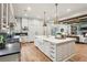Bright kitchen with white cabinets, stainless appliances, and large island with sink at 298 Saint Marys Nw Ln, Marietta, GA 30064
