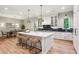 Open-concept kitchen with a large center island, modern appliances, and adjacent dining area at 298 Saint Marys Nw Ln, Marietta, GA 30064