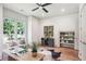 Bright and airy office with hardwood floors, custom built-ins, and large windows at 298 Saint Marys Nw Ln, Marietta, GA 30064