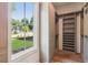 Custom walk-in closet offering ample shelving and natural light from the adjacent window at 298 Saint Marys Nw Ln, Marietta, GA 30064