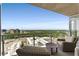 The balcony has a comfortable seating area to enjoy the city views at 3325 Piedmont Ne Rd # 2006, Atlanta, GA 30305