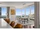 Dining room with city views, hardwood floors, and open concept flow with kitchen area at 3325 Piedmont Ne Rd # 2006, Atlanta, GA 30305