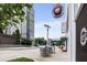 Outdoor seating area next to a business in a bustling commercial district at 3325 Piedmont Ne Rd # 2006, Atlanta, GA 30305