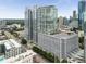 Modern building exterior showcasing its contemporary design and urban location with views at 3325 Piedmont Ne Rd # 2006, Atlanta, GA 30305