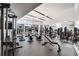 Gym featuring weight machines, treadmills, large windows with a great view and lots of natural light at 3325 Piedmont Ne Rd # 2006, Atlanta, GA 30305