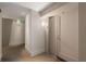 Apartment hallway with neutral carpet and wall finishes, leading to exit signs at 3325 Piedmont Ne Rd # 2006, Atlanta, GA 30305
