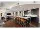 Spacious kitchen with hardwood floors, a large island, dark cabinets, and stainless steel appliances at 3325 Piedmont Ne Rd # 2006, Atlanta, GA 30305