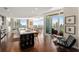 Spacious open kitchen with modern island, dark cabinetry, and expansive city views at 3325 Piedmont Ne Rd # 2006, Atlanta, GA 30305