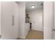 Bright laundry room with washer, dryer, storage and white walls at 3325 Piedmont Ne Rd # 2006, Atlanta, GA 30305