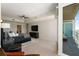 The main bedroom has neutral carpeting and a balcony with great city views at 3325 Piedmont Ne Rd # 2006, Atlanta, GA 30305