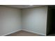 An unfinished basement space with carpet and painted walls at 2297 Horseshoe Bend Sw Rd, Marietta, GA 30064