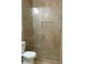Tiled bathroom featuring glass shower doors and modern fixtures at 2297 Horseshoe Bend Sw Rd, Marietta, GA 30064