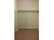 This is a plain closet with cream colored walls and brown carpet at 2297 Horseshoe Bend Sw Rd, Marietta, GA 30064