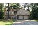 Charming home featuring a two-car garage and beautiful architectural details at 2297 Horseshoe Bend Sw Rd, Marietta, GA 30064